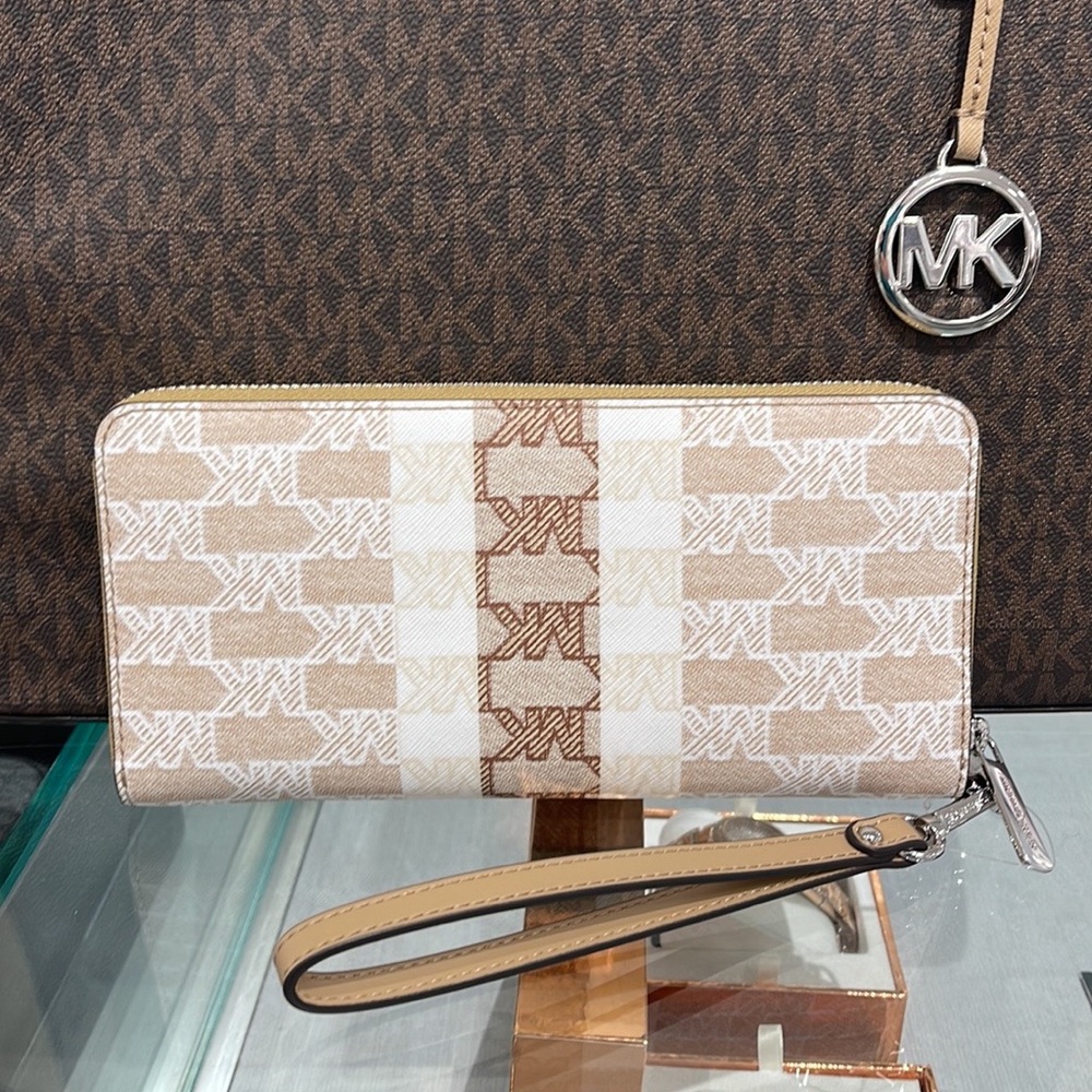 MICHAEL KORS Leather Continental Phone Holder Wristlet Wallet 
Camel 
NWT - Picture 14 of 16